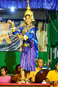 Young girl performs traditional Cambodian dance in ornate costum