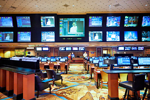 Betting area at Treasure Island Casino in Las Vegas by Marco Brivio