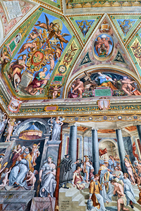 Exploring frescoes in the Raphael rooms at Vatican Museums in Ro