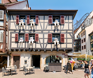 Timber framed houses with teddy bears in Colmar Alsace France