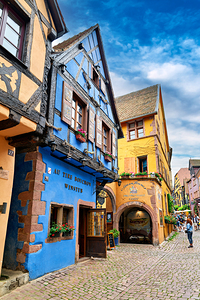 Historic timber framed houses in Riquewihr on Alsace Wine Route by Marco Brivio