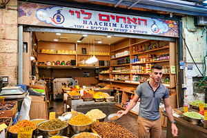 Spice vendor at Mahane Yehuda Market in Jerusalem Israel by Marco Brivio