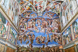 Visitors stand beneath the ceiling of Sistine Chapel in Vatican  by Marco Brivio