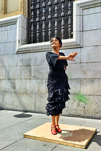 Flamenco dancer performs on street in Seville Spain by Marco Brivio
