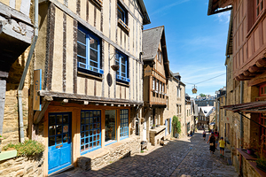 Timber houses line the streets of Dinan in Brittany France by Marco Brivio