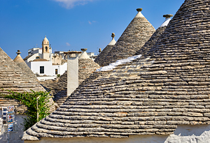 Apulia Puglia Italy. Alberobello. Trulli: traditional Apulian dry stone huts with a conical roof. by Marco Brivio