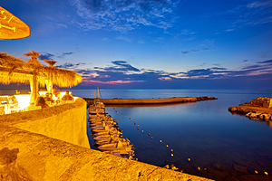 Salento. Apulia Puglia Italy. Gallipoli. Aperitif on the waterfront at sunset. by Marco Brivio