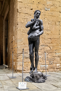 Città della Pieve Umbria Italy. Tentazione dAdamo Temptation of Adam statue by Wolfgang Alexander Kossuth 1995 by Marco Brivio