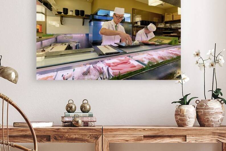 Japan. Tokyo. Preparing sushi in a sushi bar in Shibuya district by Marco Brivio