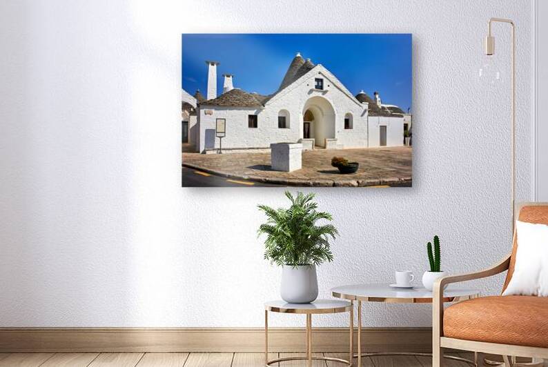 Apulia Puglia Italy. Alberobello. Trulli: traditional Apulian dry stone huts with a conical roof. Trullo Sovrano by Marco Brivio