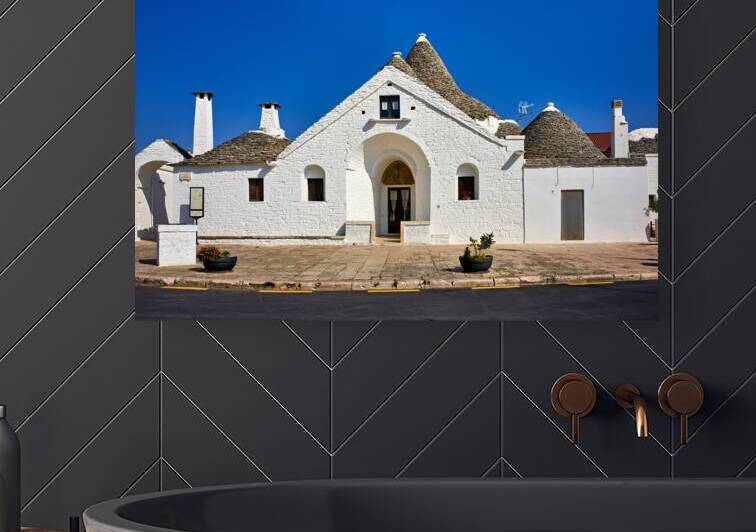 Apulia Puglia Italy. Alberobello. Trulli: traditional Apulian dry stone huts with a conical roof. Trullo Sovrano by Marco Brivio