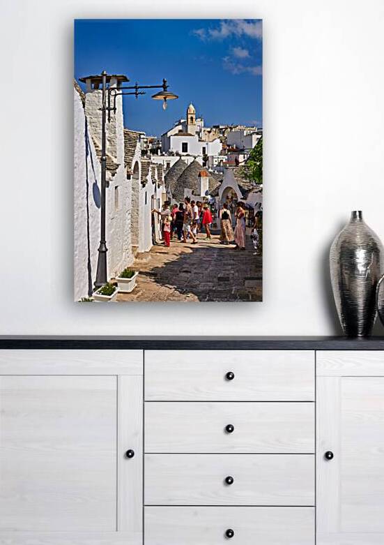 Apulia Puglia Italy. Alberobello. Trulli: traditional Apulian dry stone huts with a conical roof. by Marco Brivio