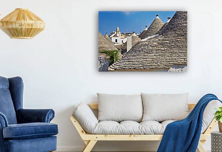 Apulia Puglia Italy. Alberobello. Trulli: traditional Apulian dry stone huts with a conical roof. by Marco Brivio