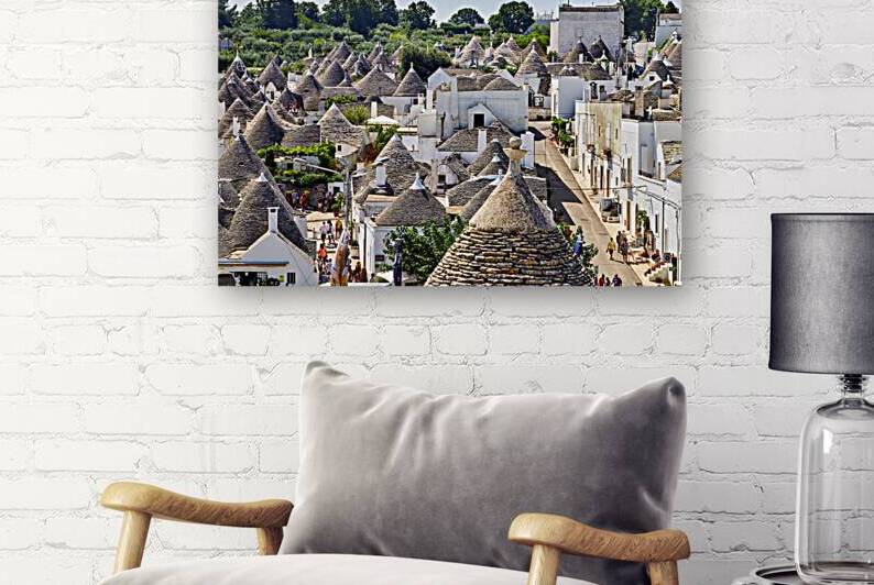 Apulia Puglia Italy. Alberobello. Trulli: traditional Apulian dry stone huts with a conical roof. by Marco Brivio