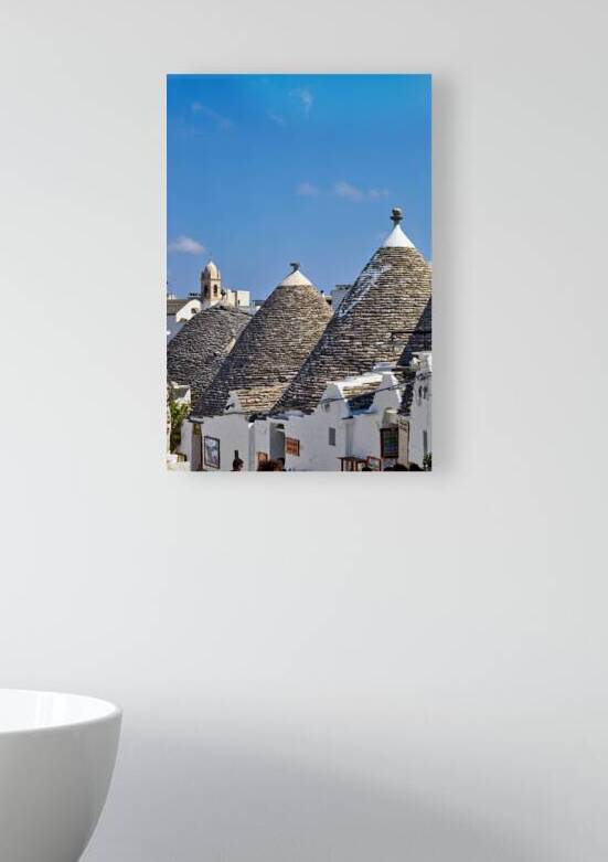 Apulia Puglia Italy. Alberobello. Trulli: traditional Apulian dry stone huts with a conical roof. by Marco Brivio