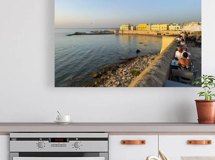 Gallipoli Puglia Salento Italy. Aperitif ay sunset at the town walls by Marco Brivio