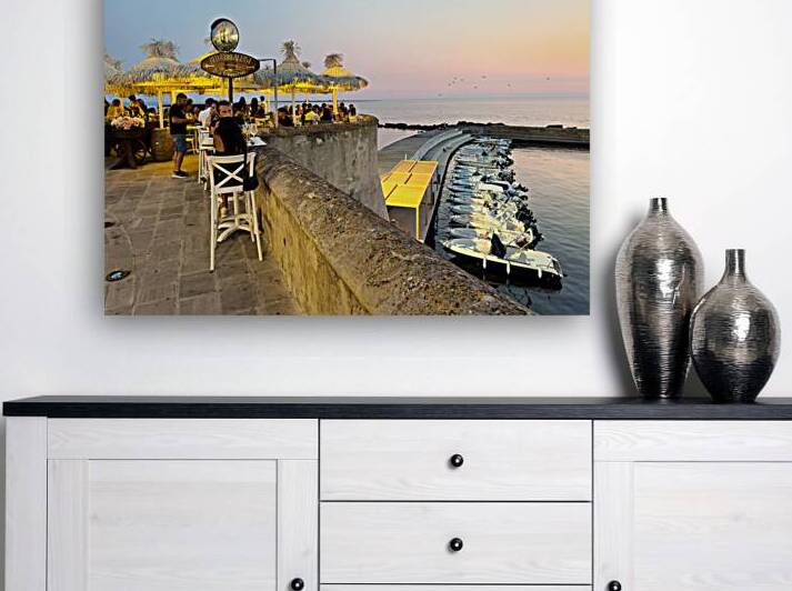 Gallipoli Puglia Salento Italy. Aperitif ay sunset at the town walls by Marco Brivio