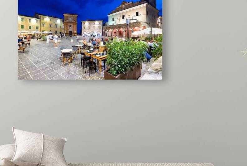 Montefalco Umbria Italy. Piazza del Comune at sunset. People eating out by Marco Brivio