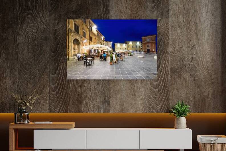 Montefalco Umbria Italy. Piazza del Comune at sunset. People eating out by Marco Brivio