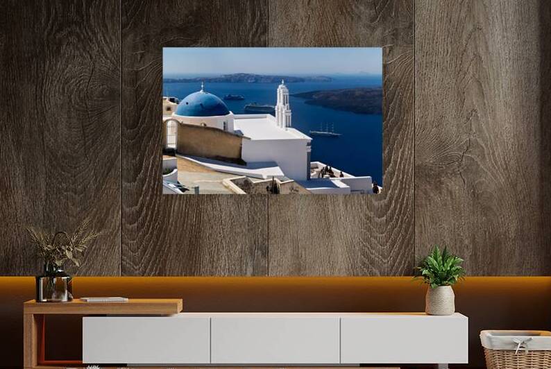 Santorinis blue dome church overlooks caldera with cruise ships by Marco Brivio