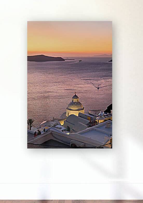 Sunset over Santorini caldera with church and boats. by Marco Brivio
