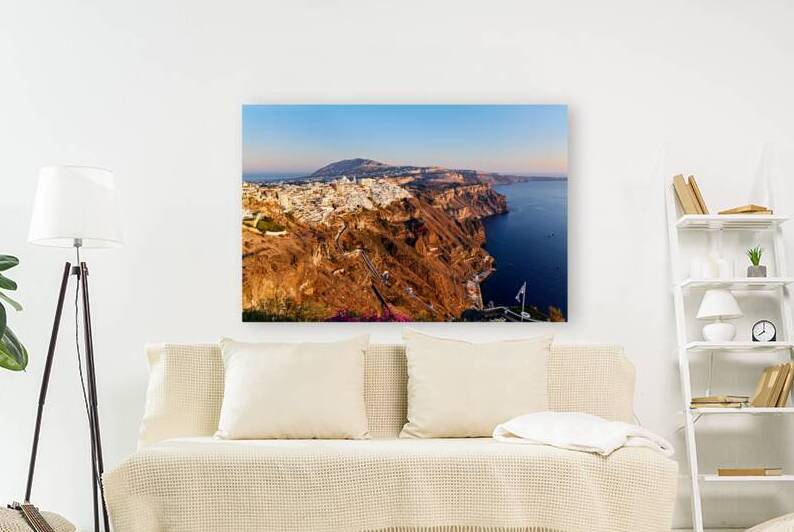 Santorinis iconic white village on caldera cliffs Aegean Sea. by Marco Brivio