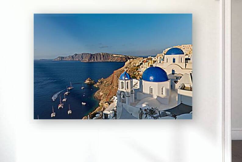 Stunning Santorini vista: blue domes white village caldera bo by Marco Brivio