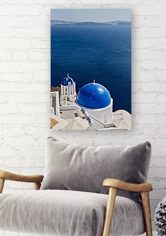 Santorinis blue domes and caldera view. by Marco Brivio