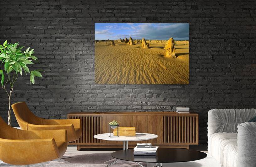 Golden light on the Pinnacles Desert in Western Australia. by Marco Brivio