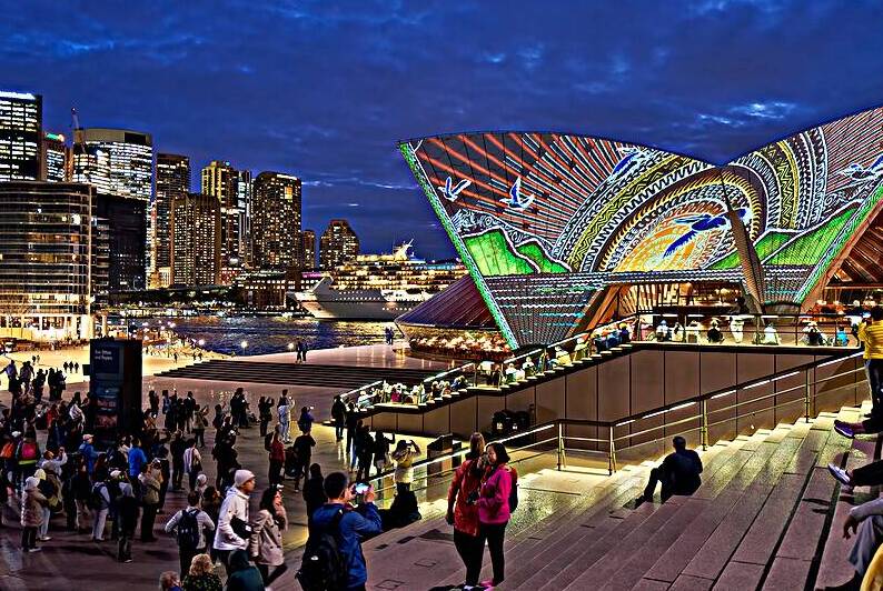 Sydney Opera House illuminated with projection art at night. by Marco Brivio