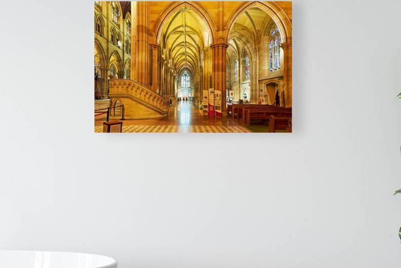 Interior of a grand cathedral with stained glass windows. by Marco Brivio