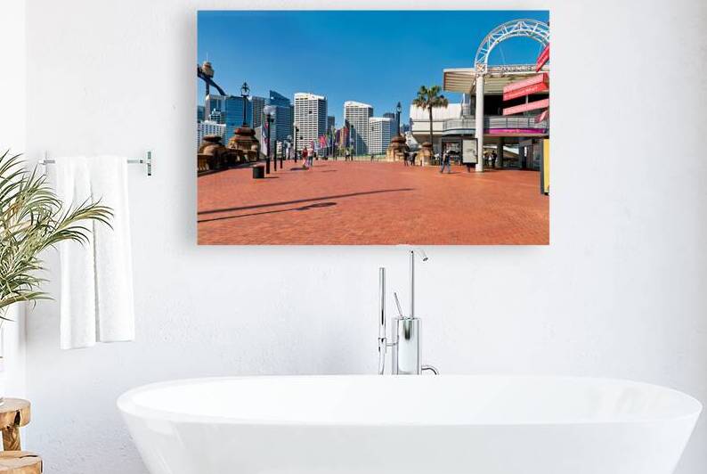 Sydney Harbour with modern buildings and people walking. by Marco Brivio