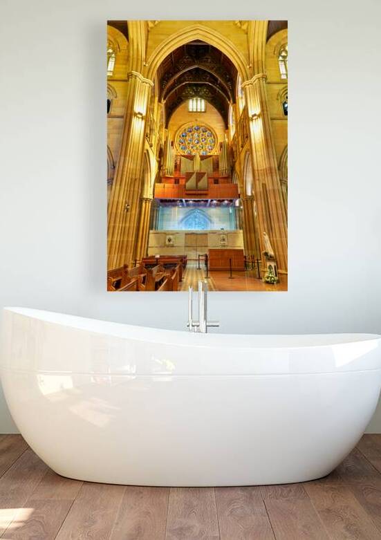 Interior of a grand cathedral with pipe organ and stained glass. by Marco Brivio