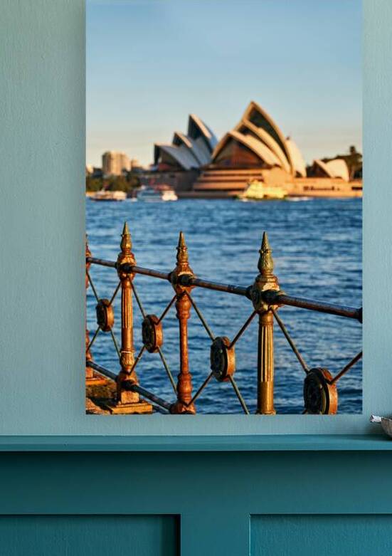 Sydney Opera House and harbor at sunset. by Marco Brivio