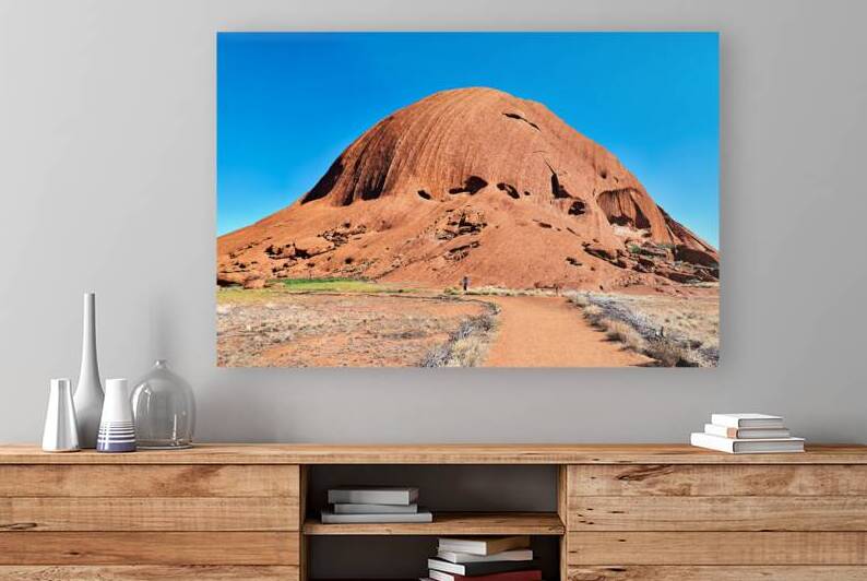 Uluru Australias iconic sandstone monolith under a clear blue by Marco Brivio