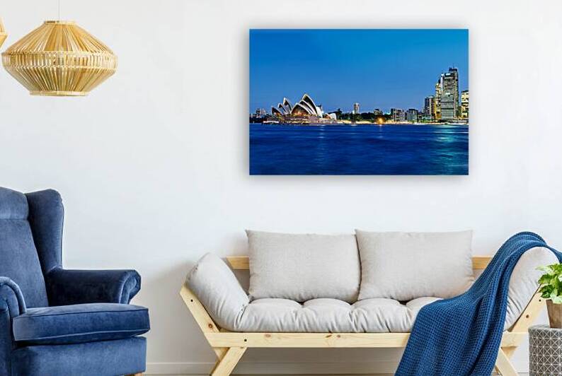 Sydney Opera House and city skyline at dusk. by Marco Brivio