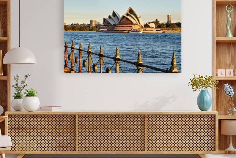 Sydney Opera House and harbor at sunset. by Marco Brivio