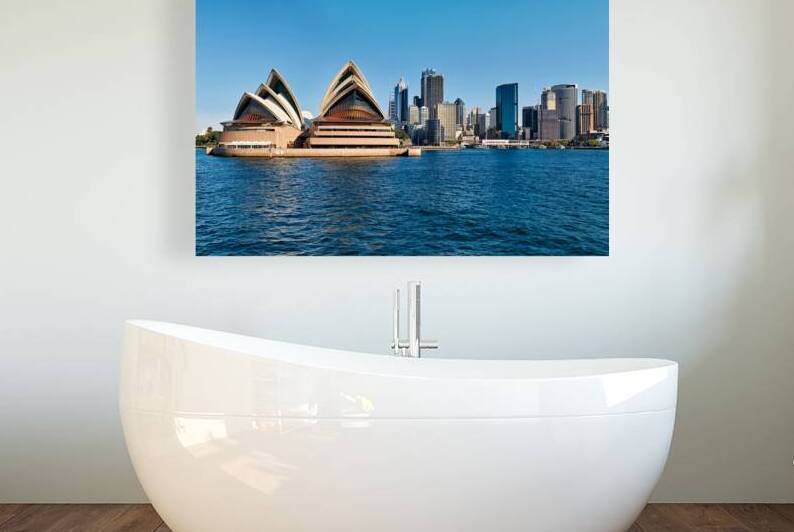 Sydney Opera House and city skyline across the harbor. by Marco Brivio