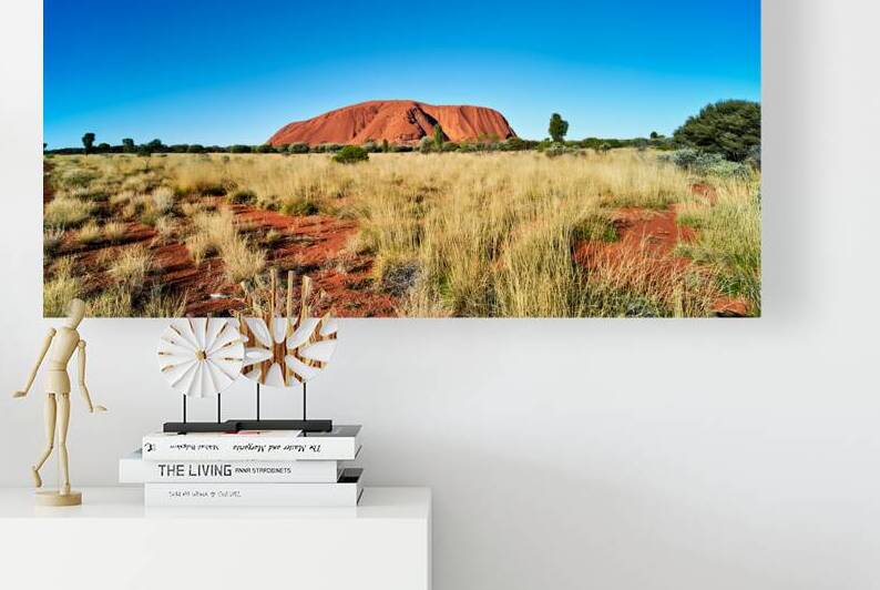 Uluru Australias iconic sandstone monolith under a clear blue by Marco Brivio