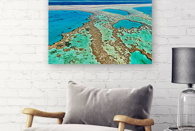 Aerial view of the Great Barrier Reefs coral formations. by Marco Brivio