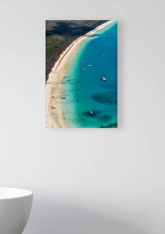 Aerial view of a tropical beach with boats and people. by Marco Brivio