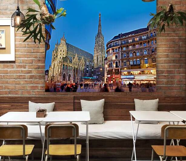 St. Stephens Cathedral at dusk in bustling Vienna. by Marco Brivio