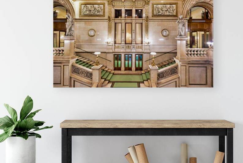 Grand ornate staircase inside a historic opera house. by Marco Brivio