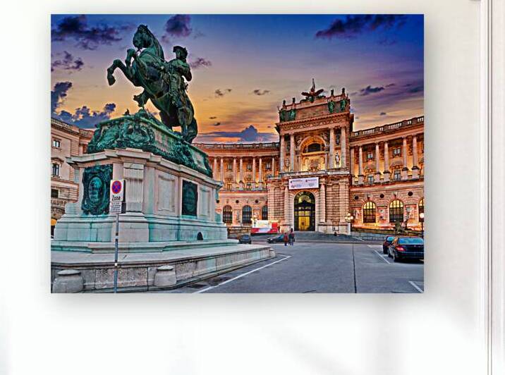 Viennas Hofburg Palace and equestrian statue at twilight. by Marco Brivio