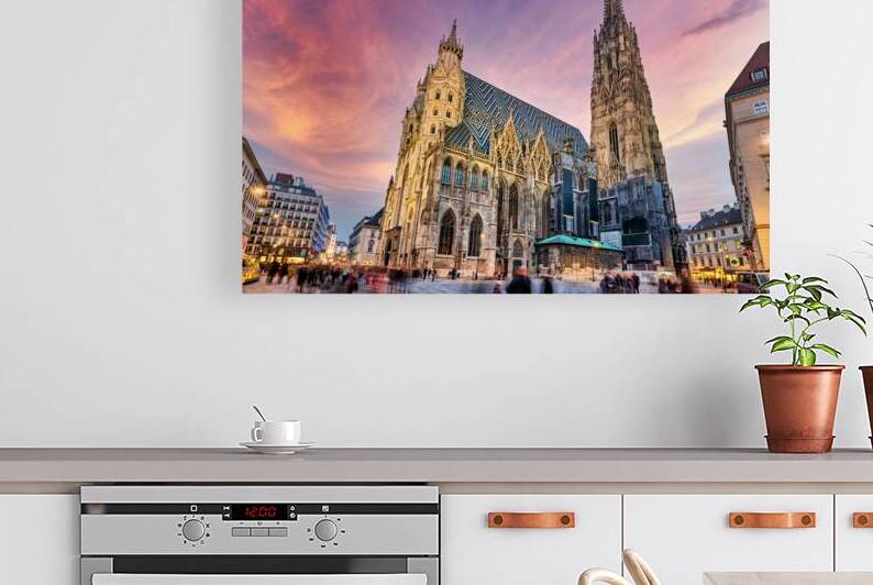 Majestic St. Stephens Cathedral in Vienna under a colorful sky. by Marco Brivio