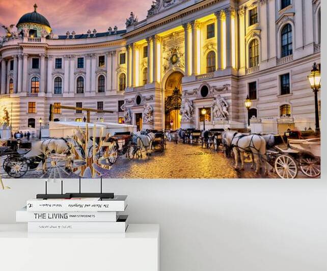 Illuminated Hofburg Palace and carriages at twilight in Vienna. by Marco Brivio