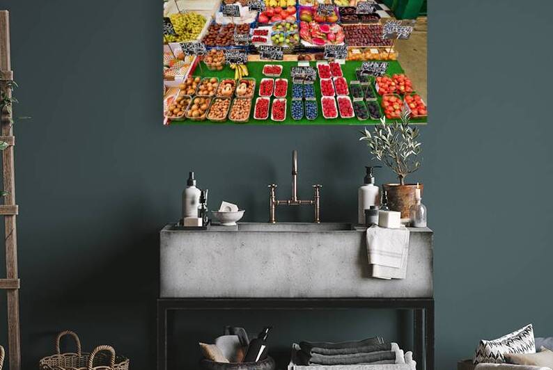Colorful market stall overflowing with fresh fruits and nuts. by Marco Brivio