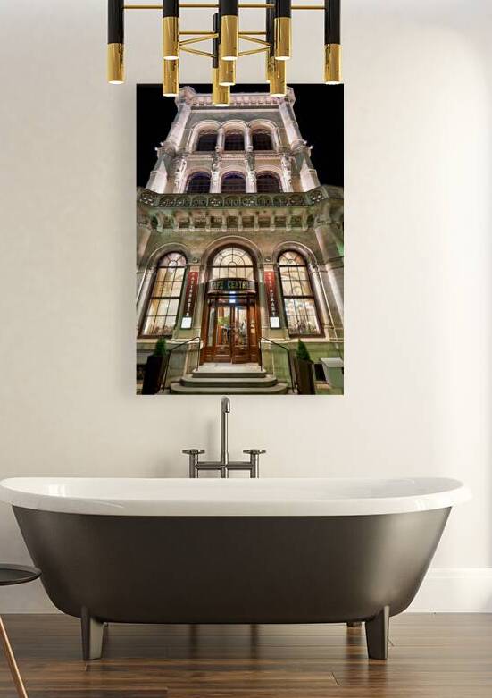 Grand Cafe Central building illuminated at night. by Marco Brivio