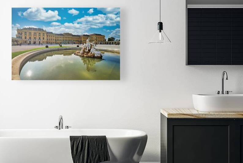 Schönbrunn Palace Vienna with Neptune Fountain and blue sky. by Marco Brivio