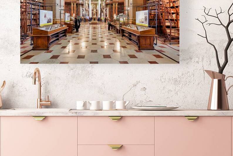 Ornate historic library interior with towering bookshelves and v by Marco Brivio